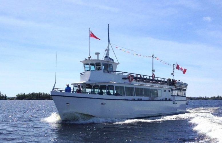 sightseeing and tour boat heading north to tobermory