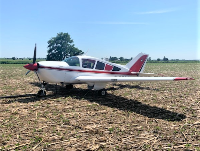 plane lands in soybean field south of